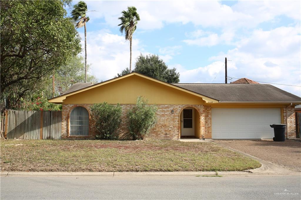 a view of a house with a sink and yard