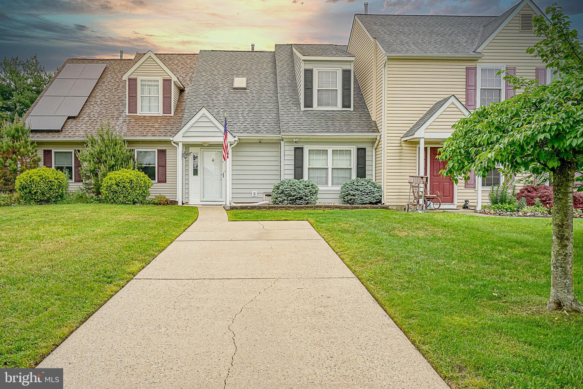 a front view of house with yard