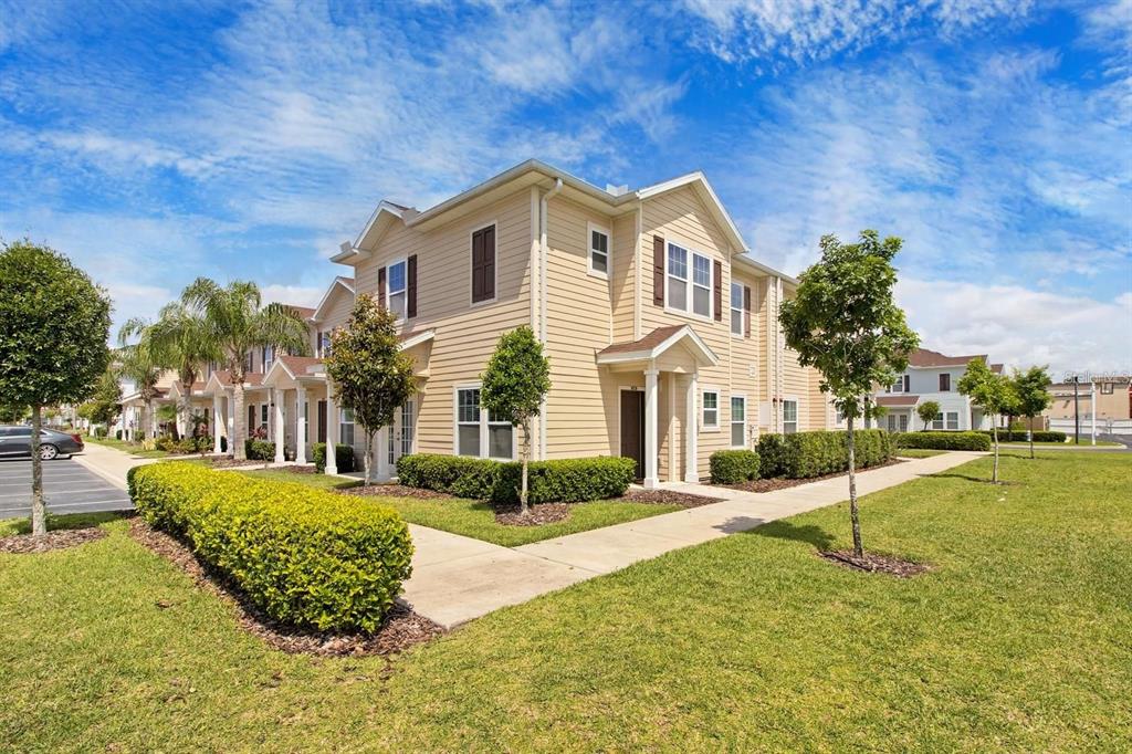 a front view of a house with a yard