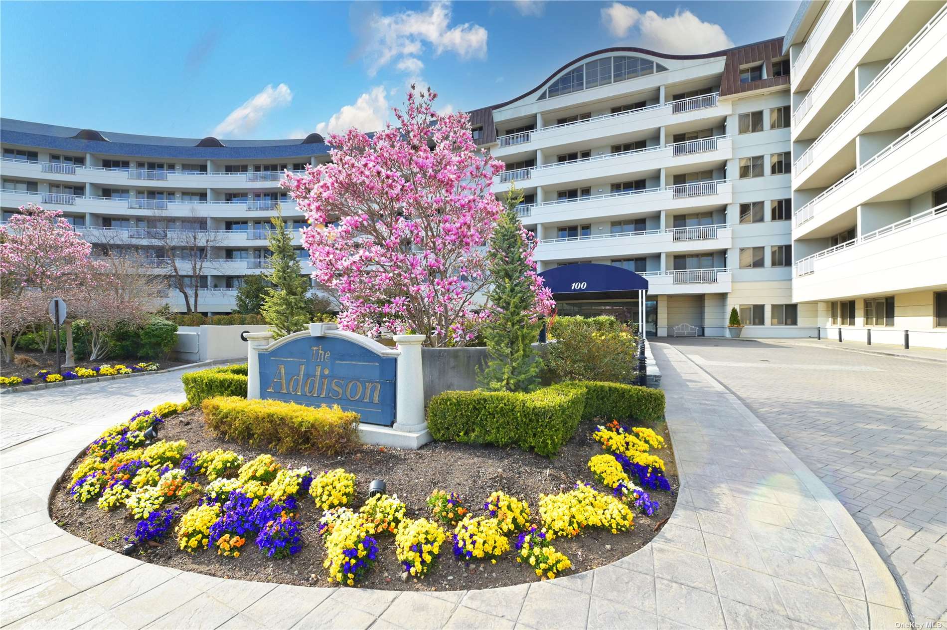 a front view of building with an outdoor space