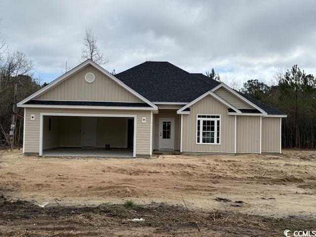 View of front of house with a garage