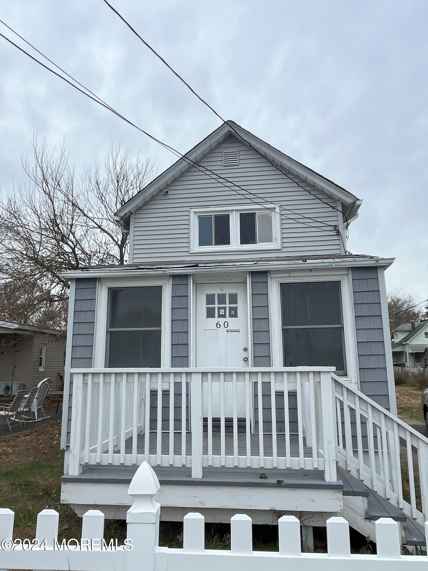 a front view of a house with balcony