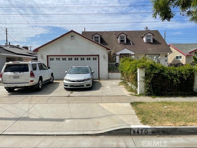 a car parked in front of a house