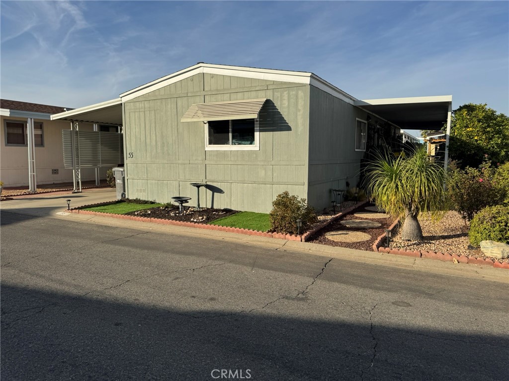 a front view of a house with garage