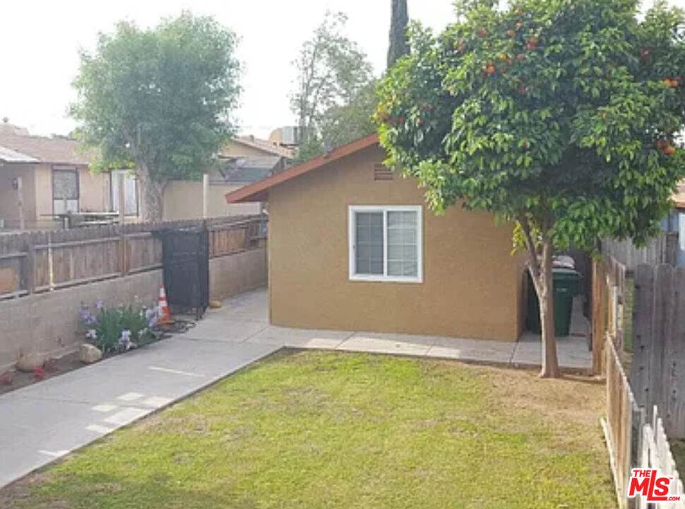 a house with trees in front of it