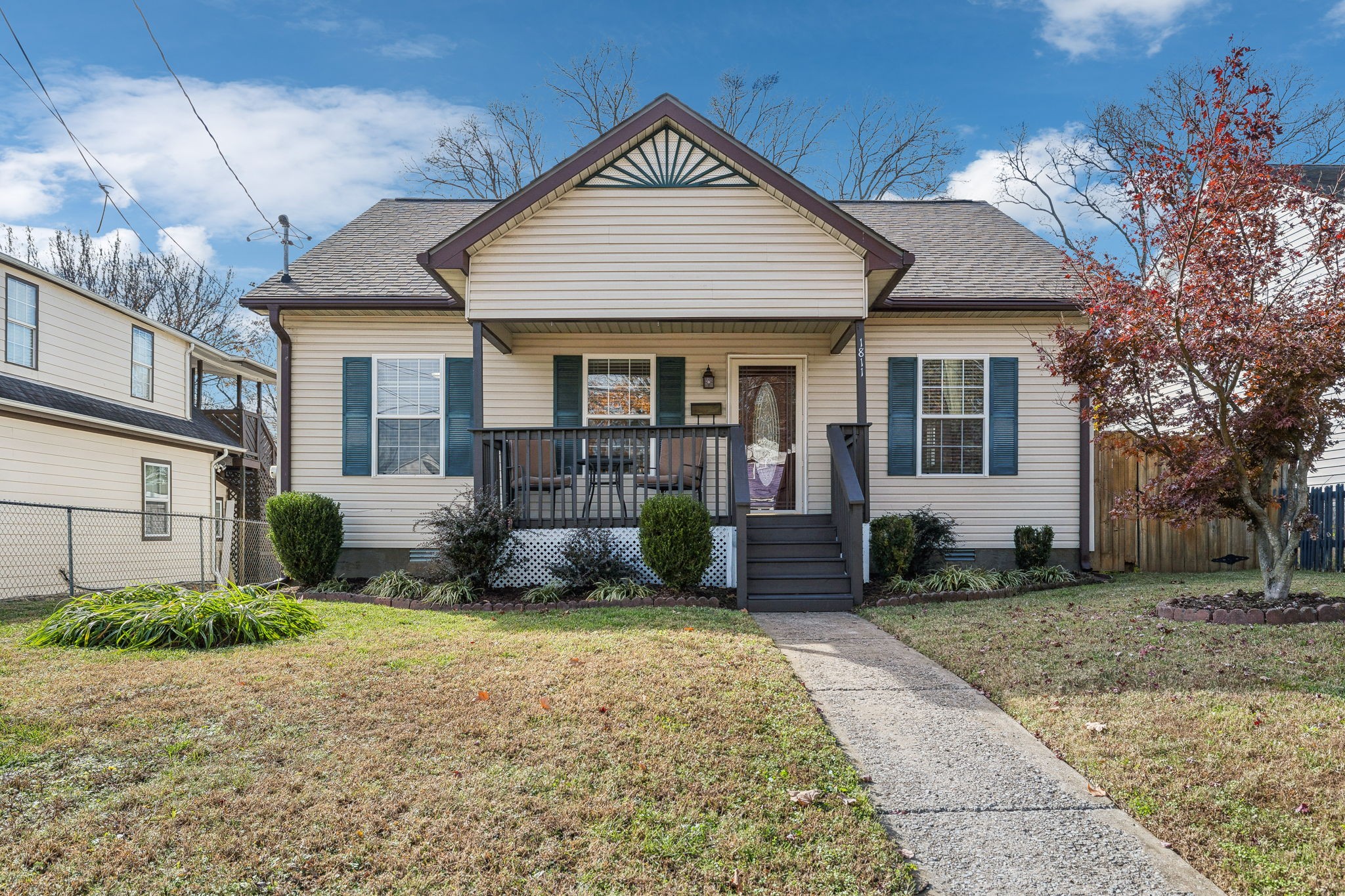 a front view of a house with garden