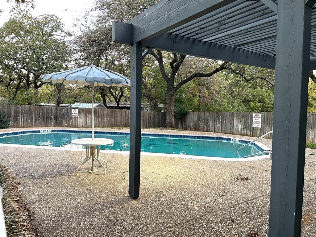 a view of a small yard with a slide