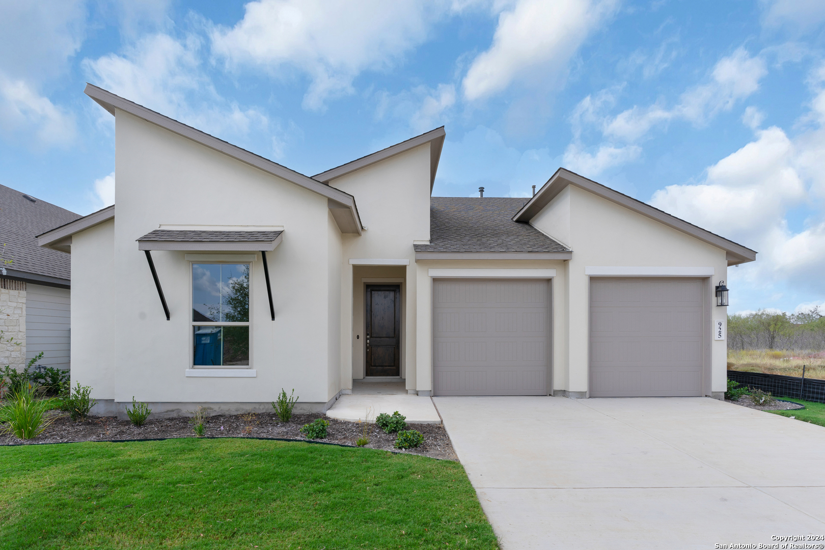 a front view of house with yard