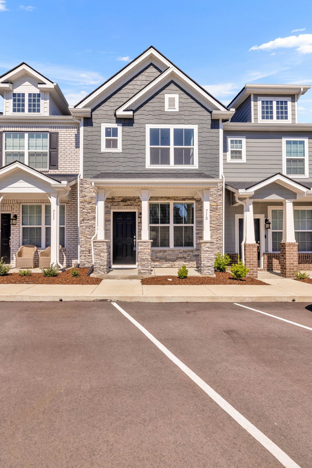 a front view of a building and a yard