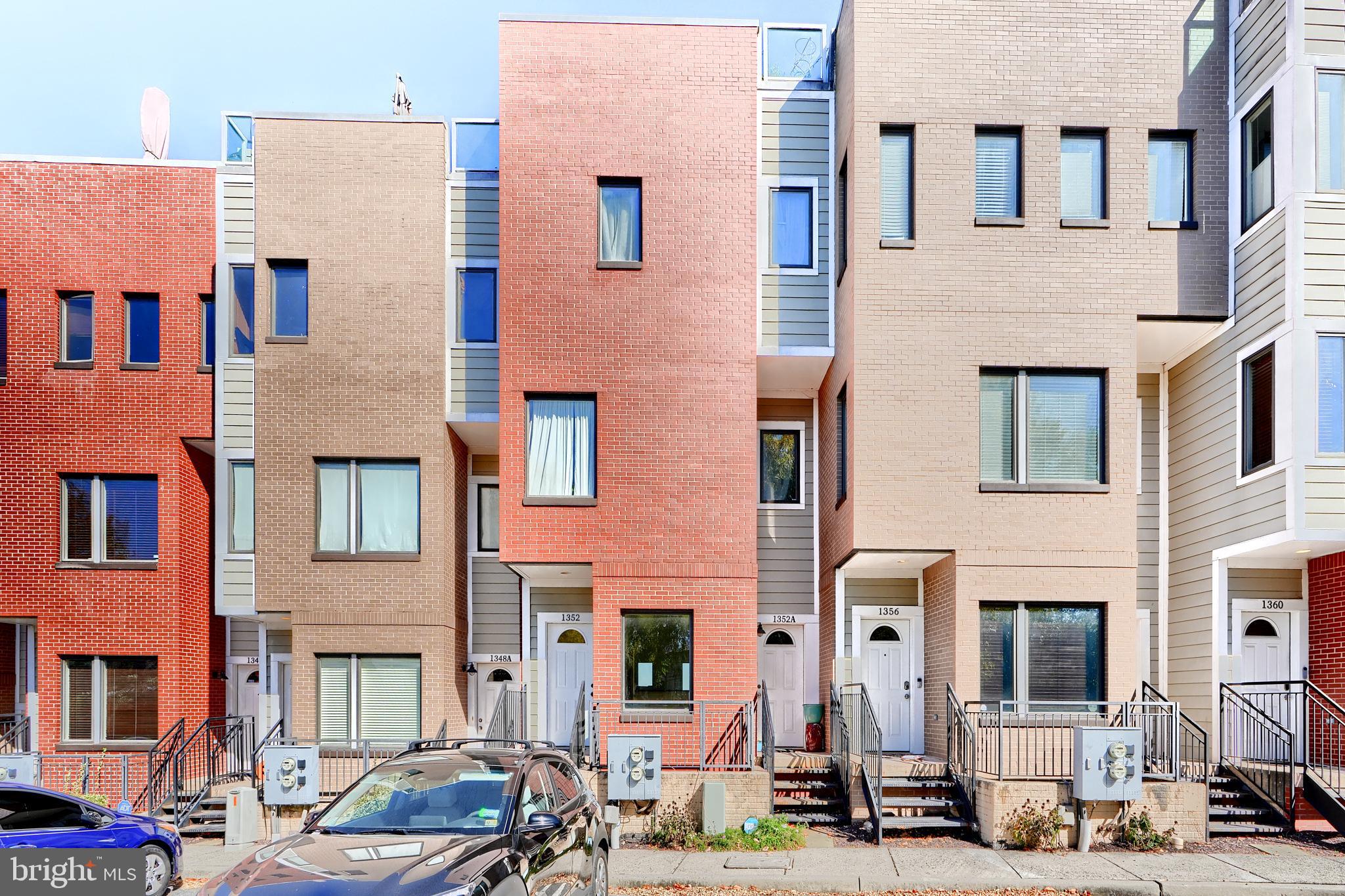 a front view of a building with street view