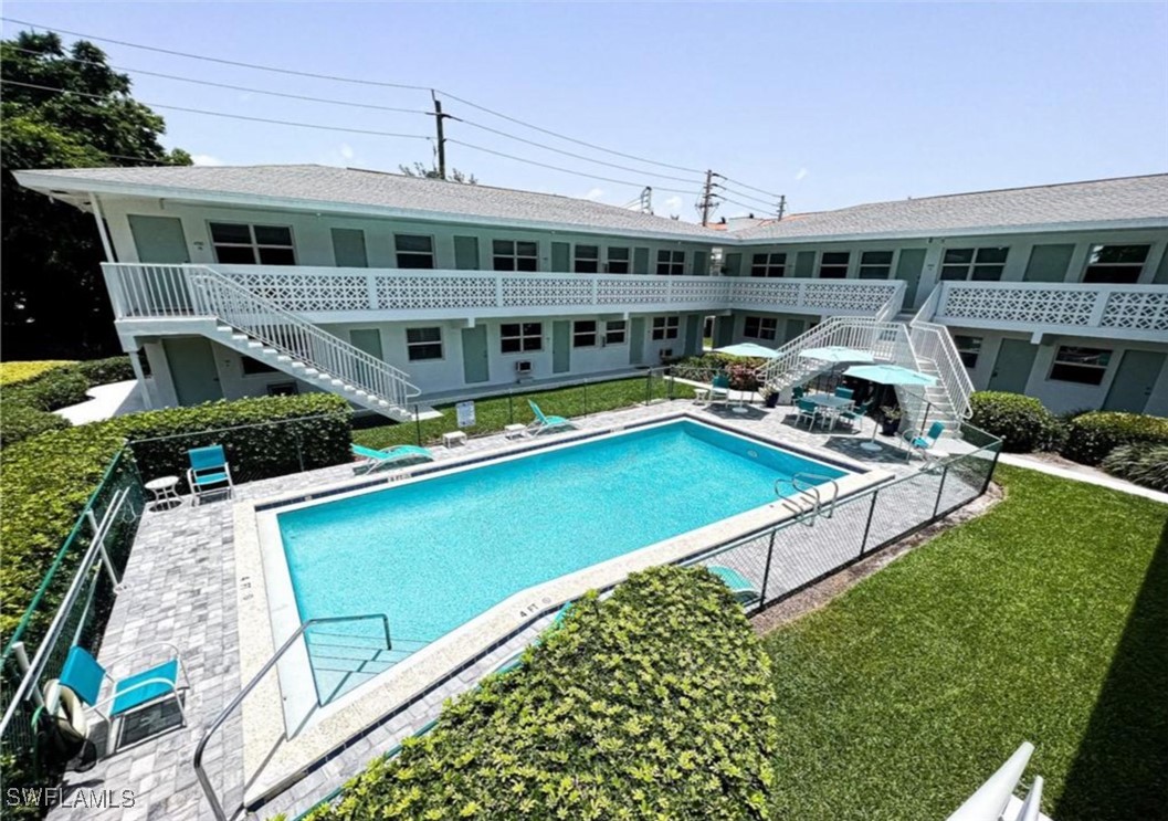 a view of a house with roof deck