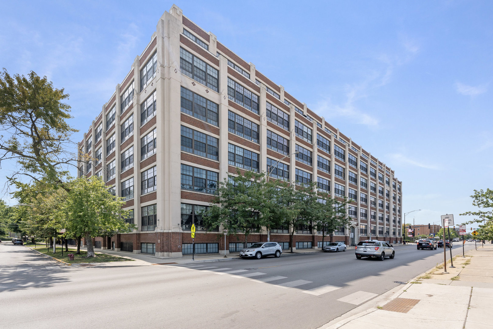 a view of a building with a street