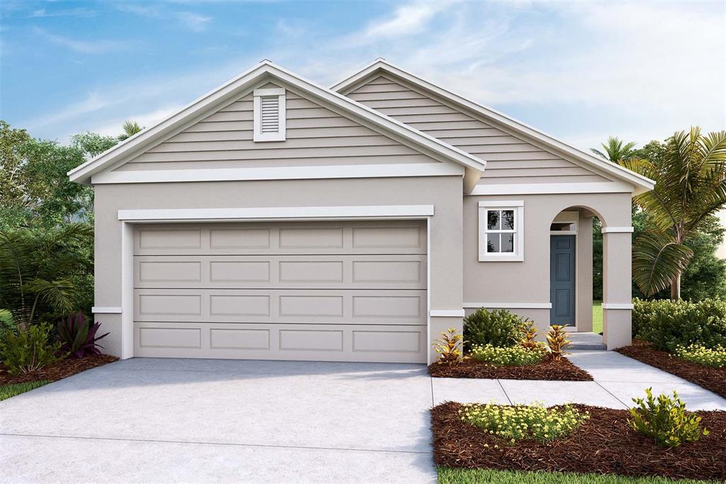 a front view of a house with a yard and garage