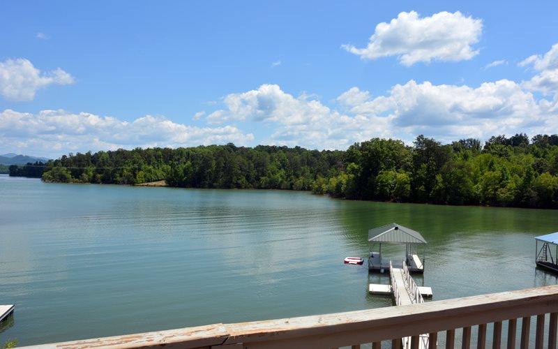 a view of a lake from a balcony