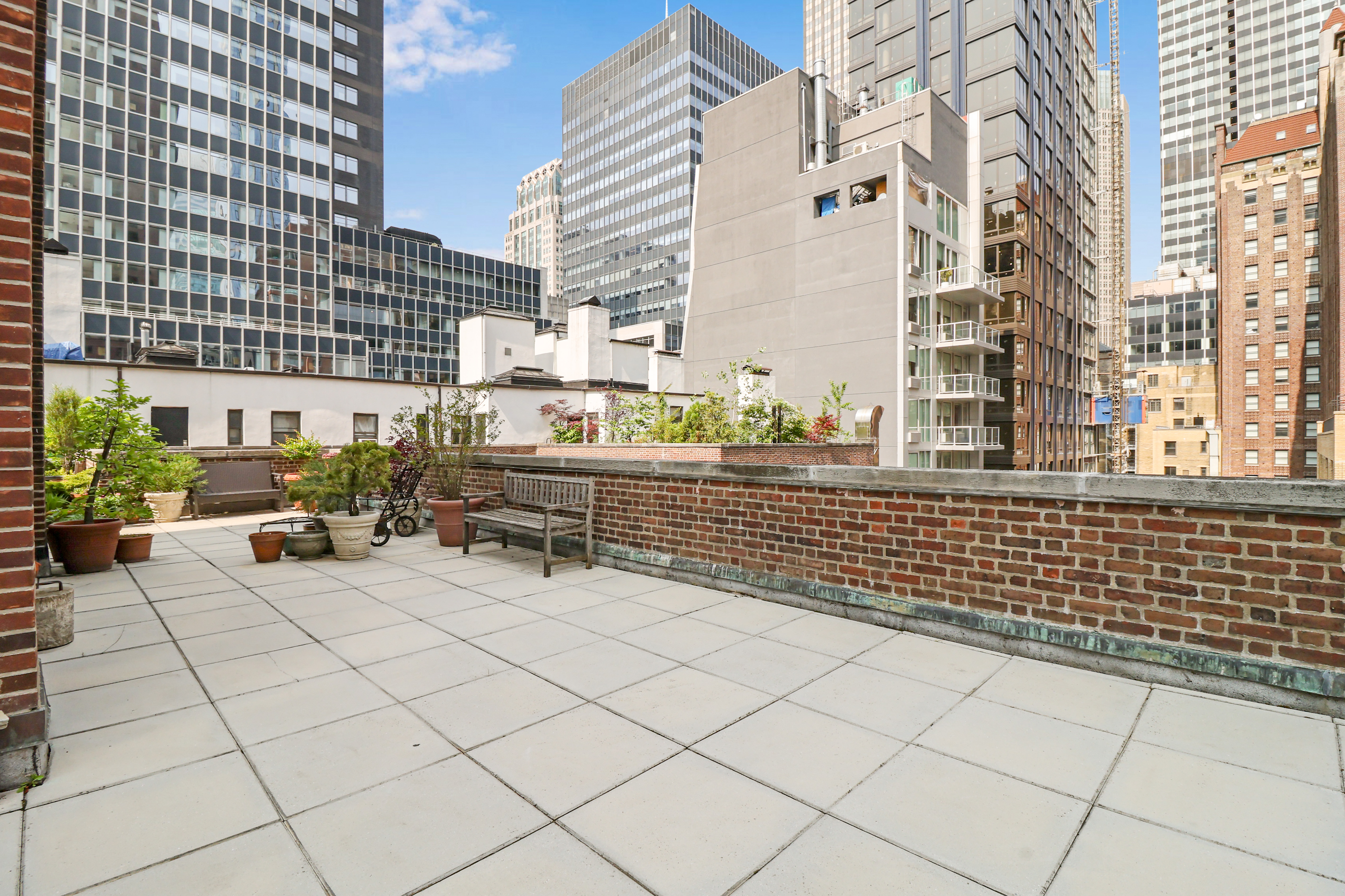 a view of a terrace with chairs