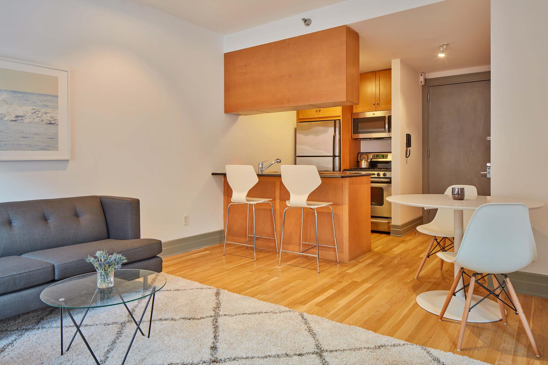 a living room with furniture and a table