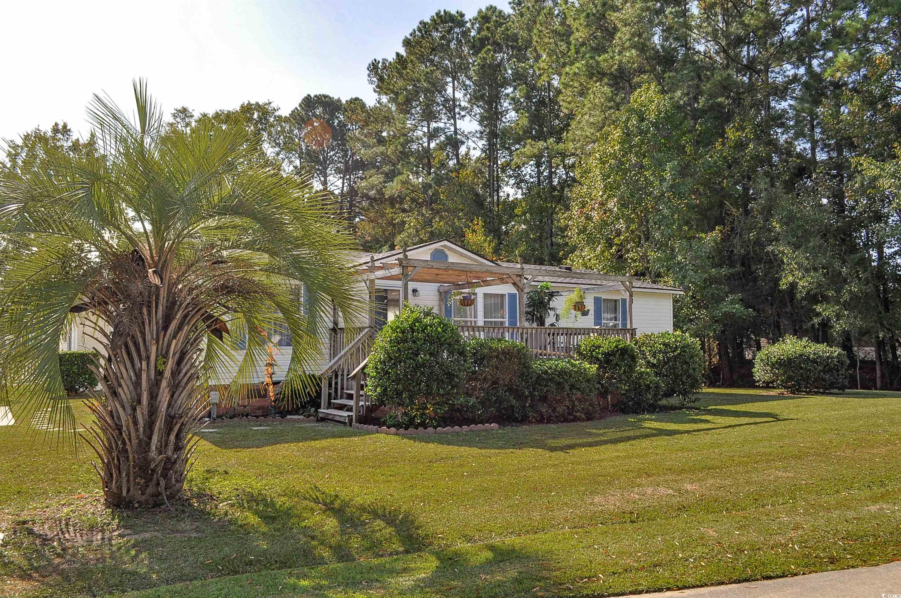 View of front of house with a front lawn