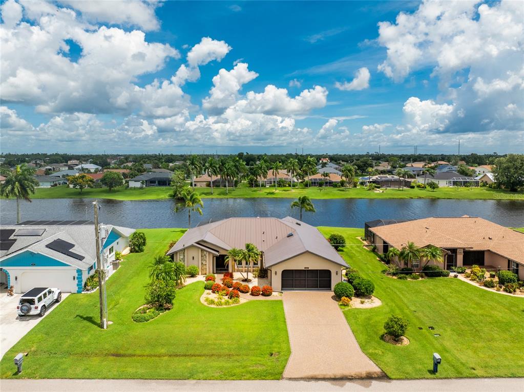 an aerial view of a house with a garden