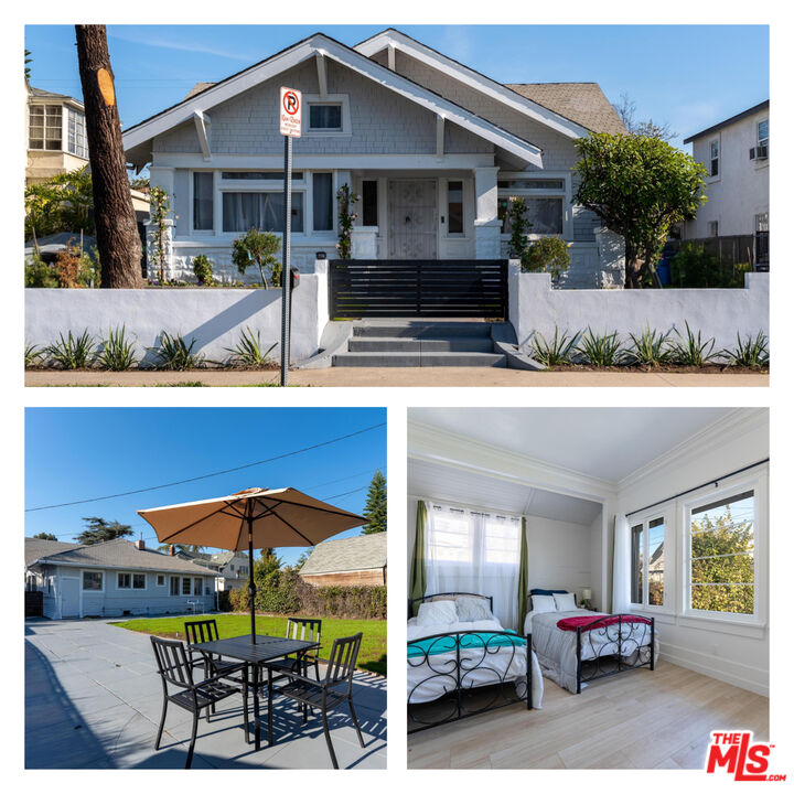 a front view of house with yard outdoor seating and barbeque oven