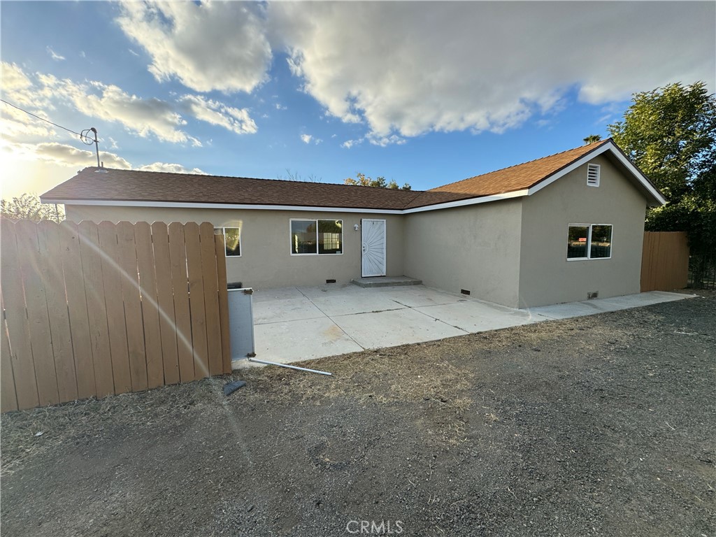 a view of garage and yard