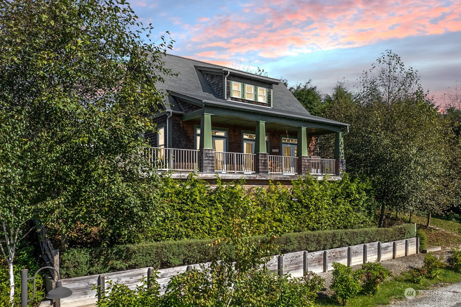 front view of a house with a garden