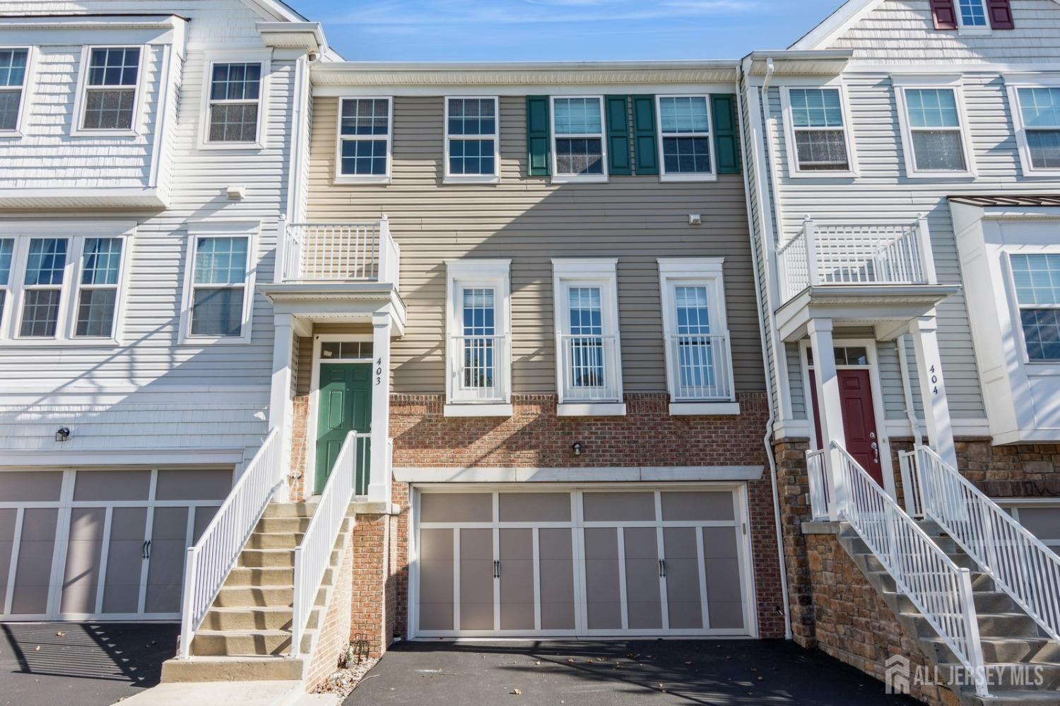 a front view of a house with a balcony