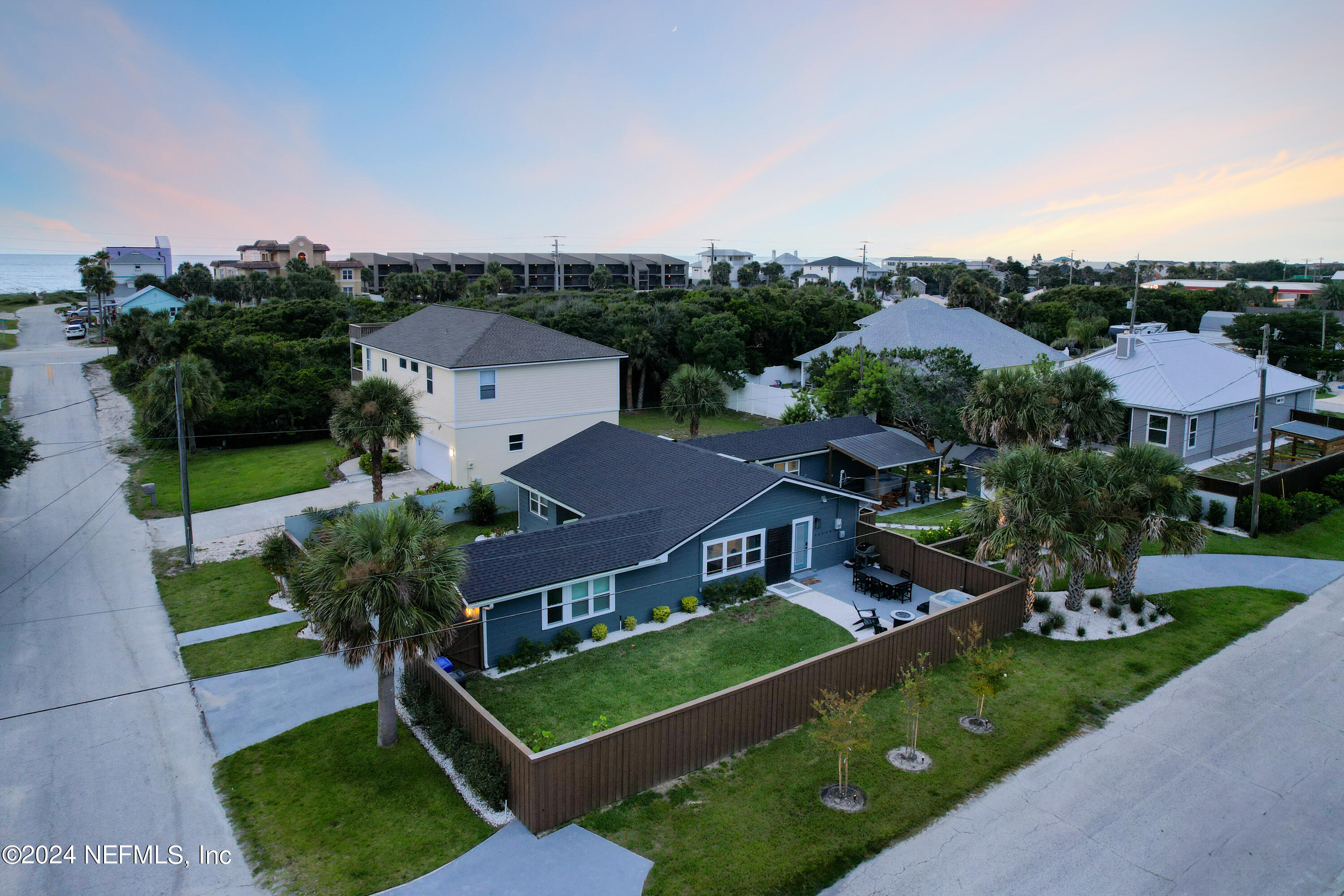 an aerial view of a house with a garden