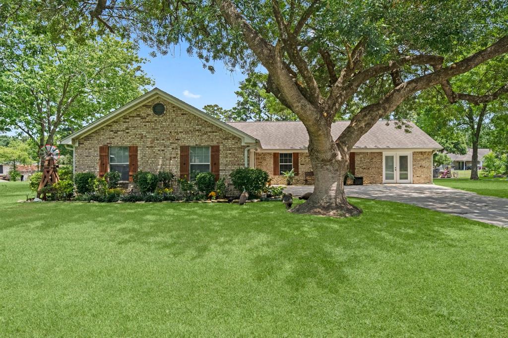 a front view of a house with a garden and porch