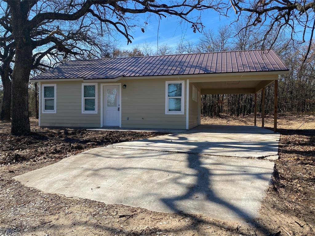 a view of a house with a patio