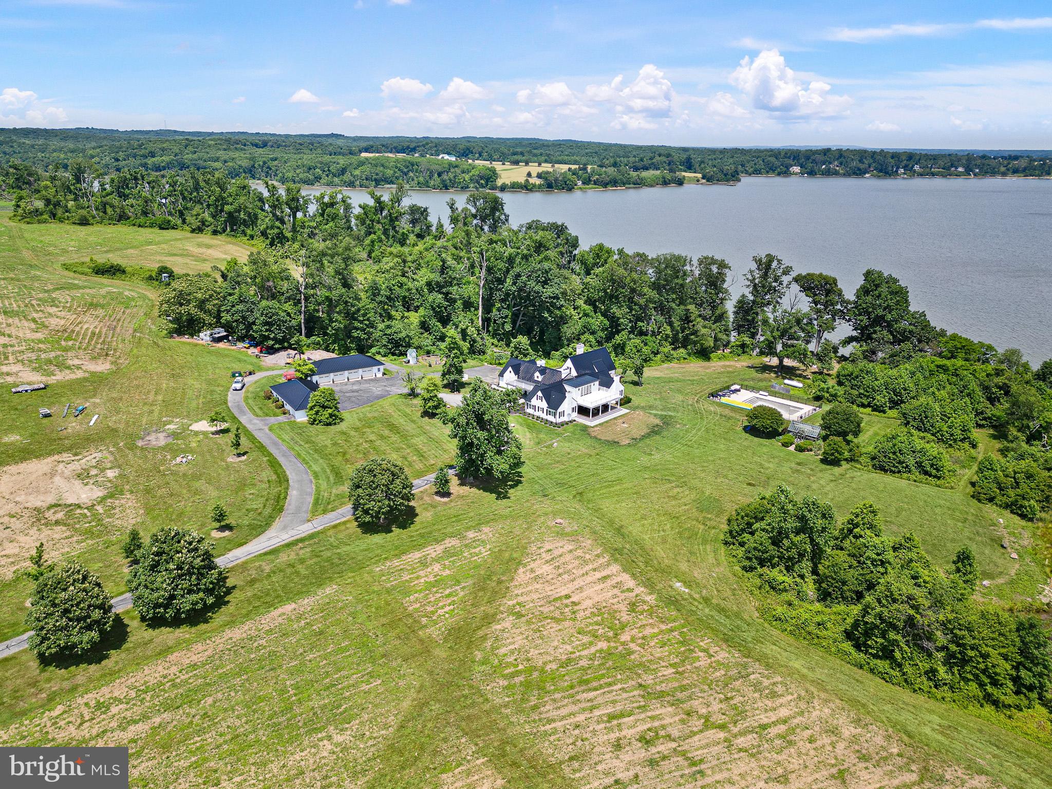 a view of a lake with houses in the back