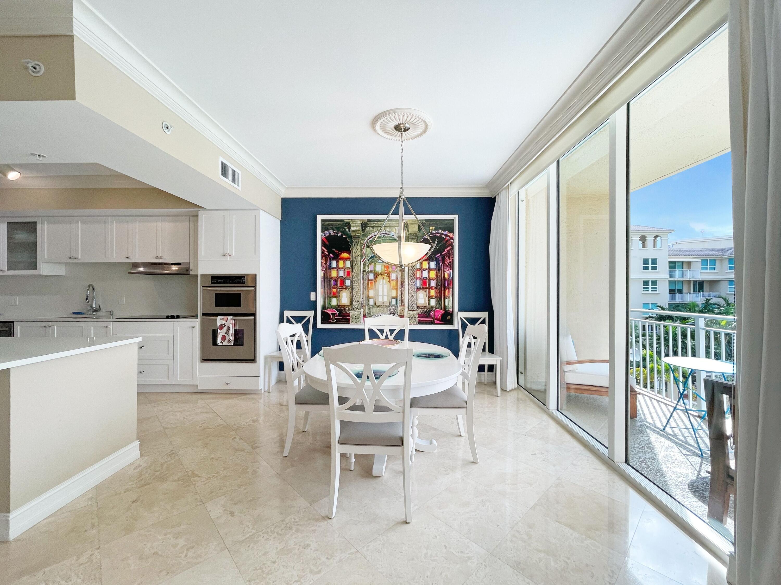 a view of a dining room furniture window and outside view