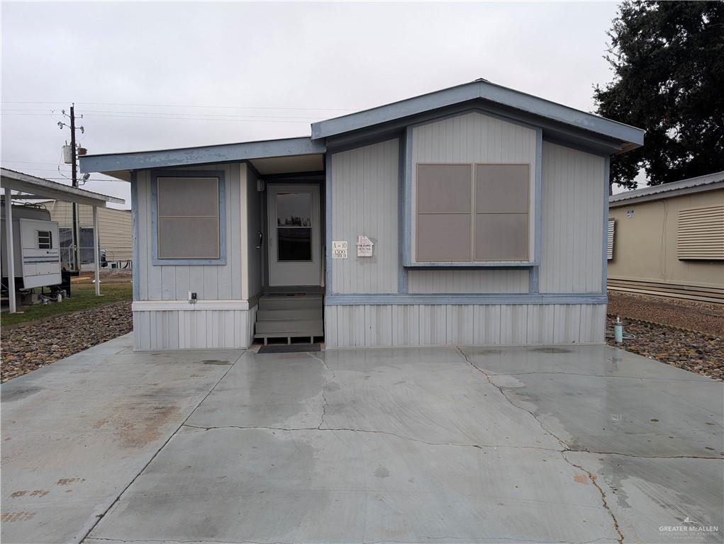 a view of backyard of house