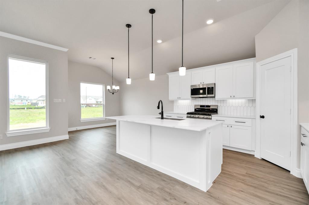 Open concept kitchen with kitchen island