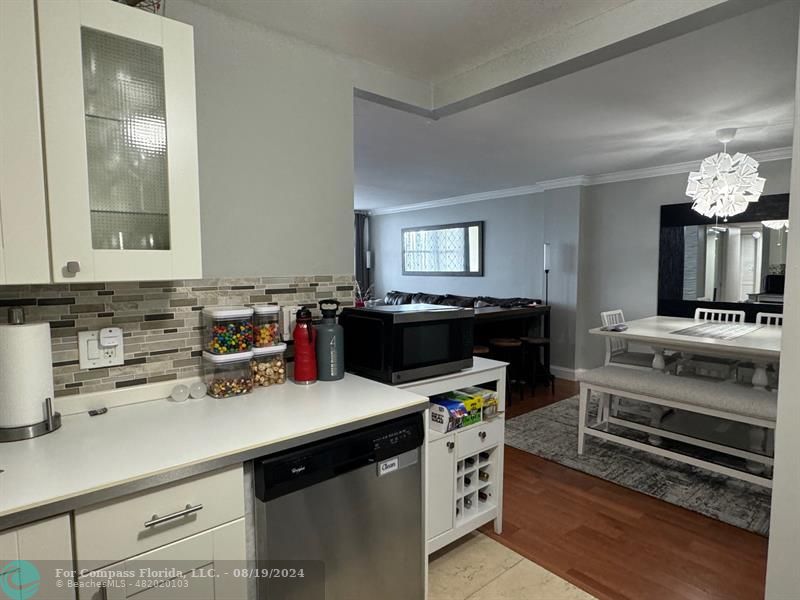 a kitchen with a stove and a sink