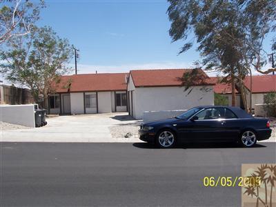 a car parked in front of a house