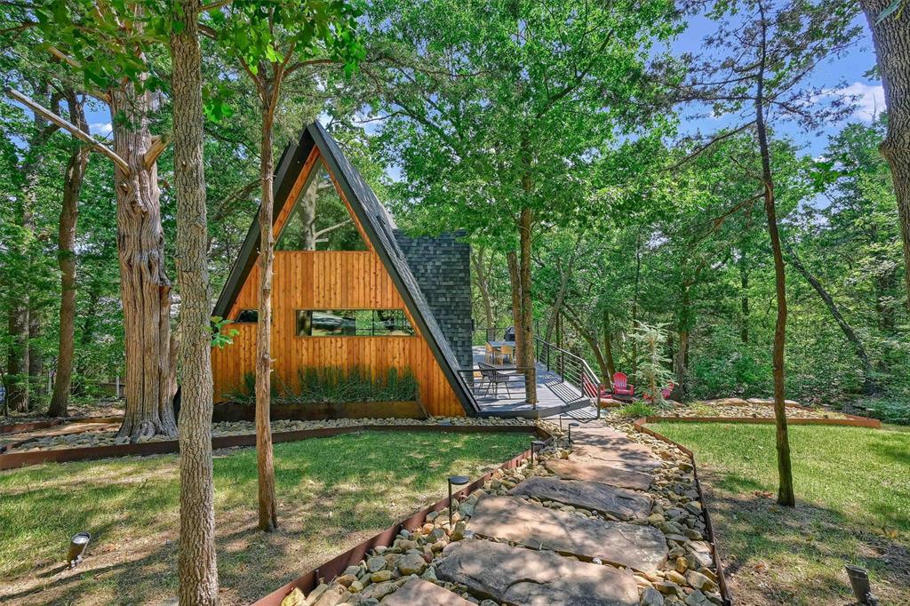 a view of outdoor space with a backyard