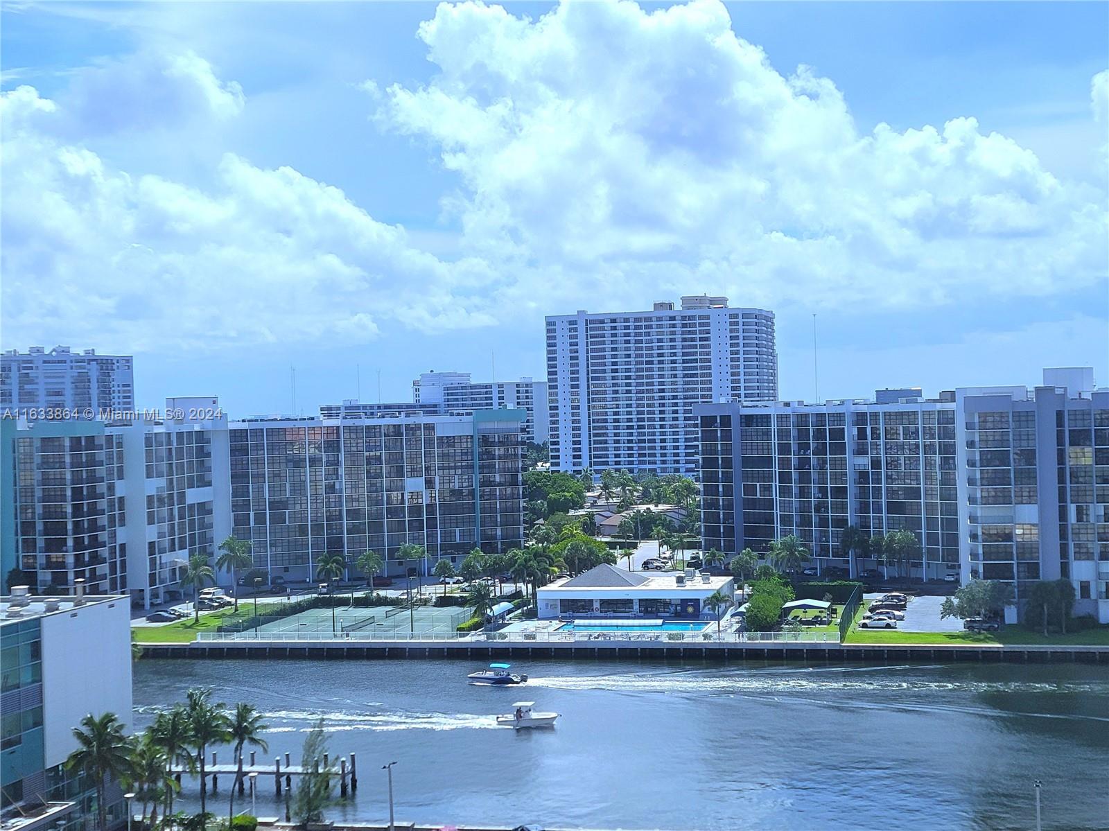 a view of a city with tall buildings