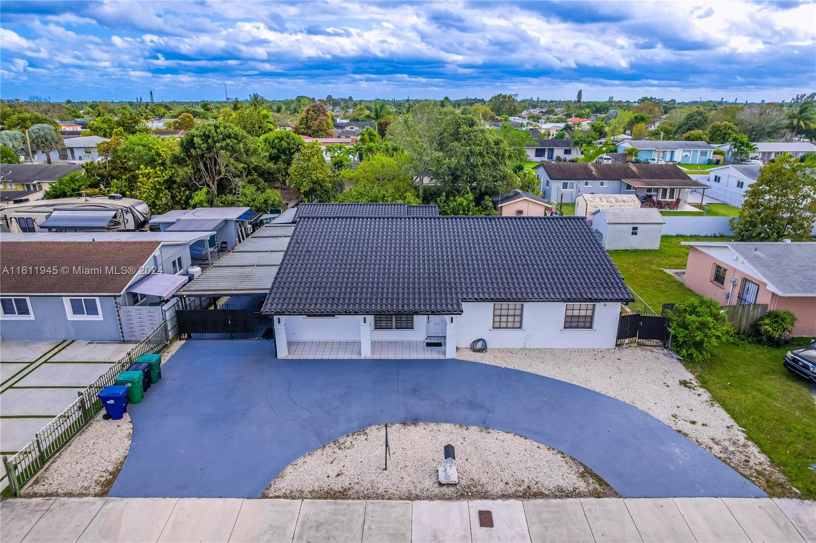 an aerial view of a house with a garden