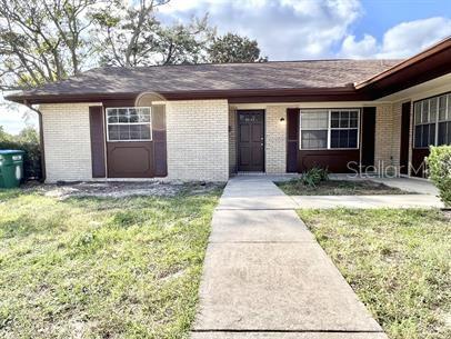 a front view of house with yard