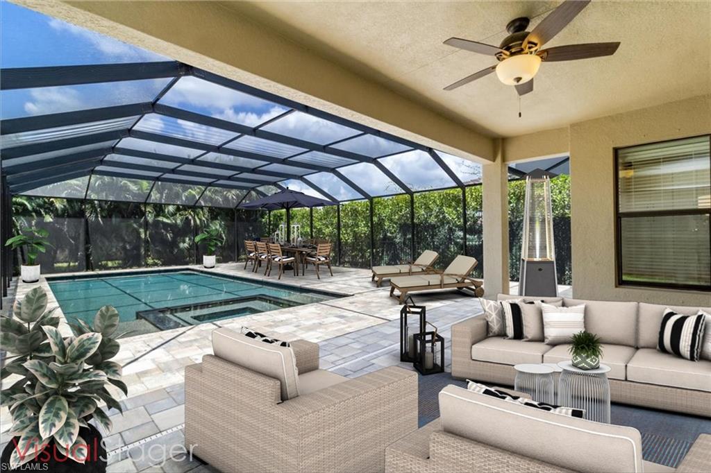 a view of a patio couches and chairs under an umbrella