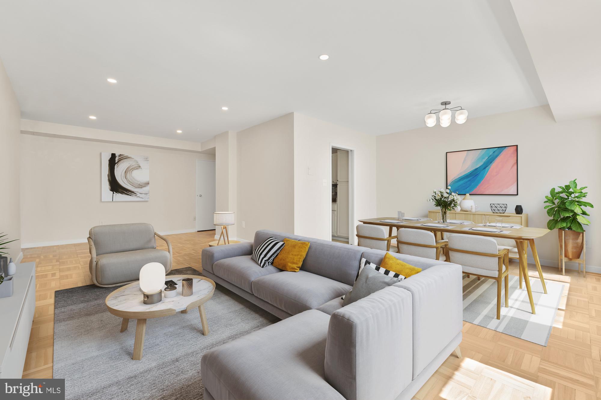 a living room with furniture and a rug