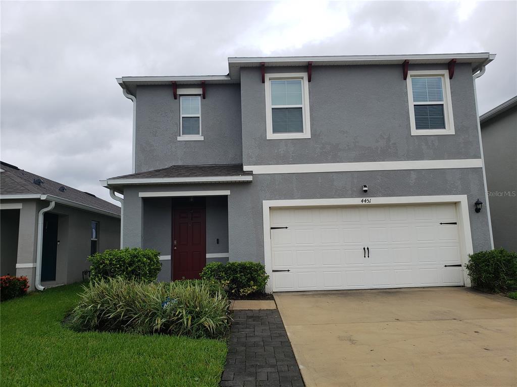 a front view of house with yard