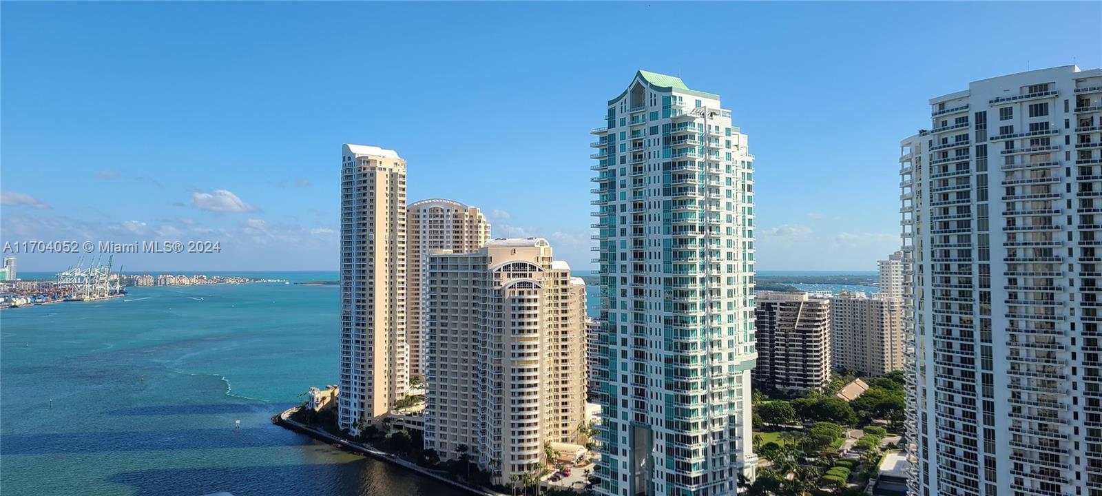 a view of a city with tall buildings