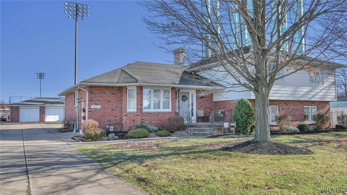 Brick and maintenance free siding