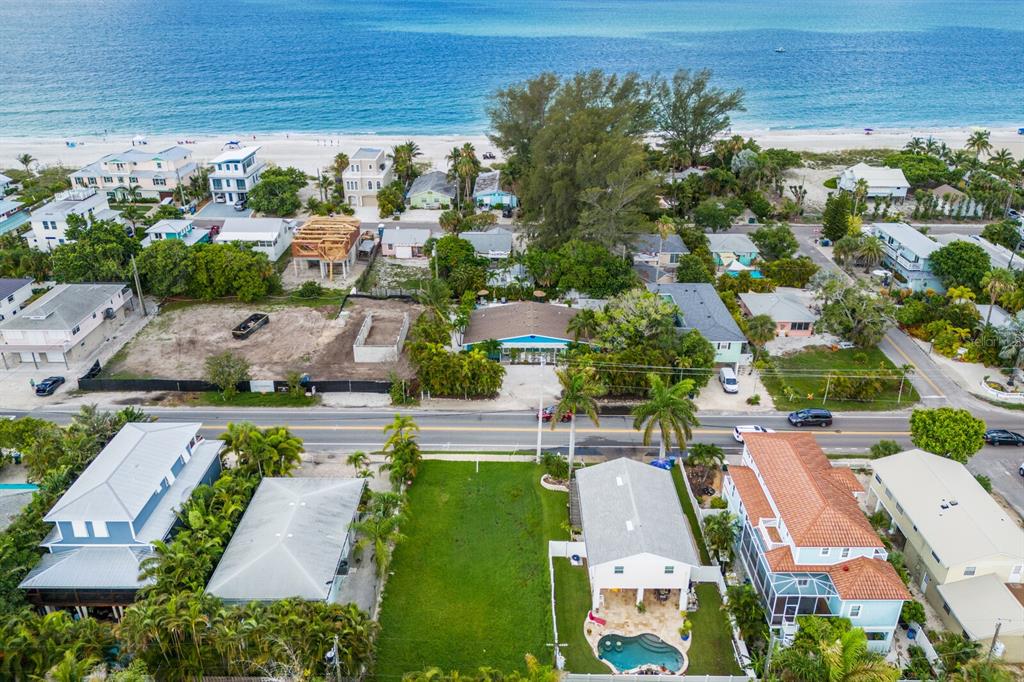 an aerial view of a house with a garden