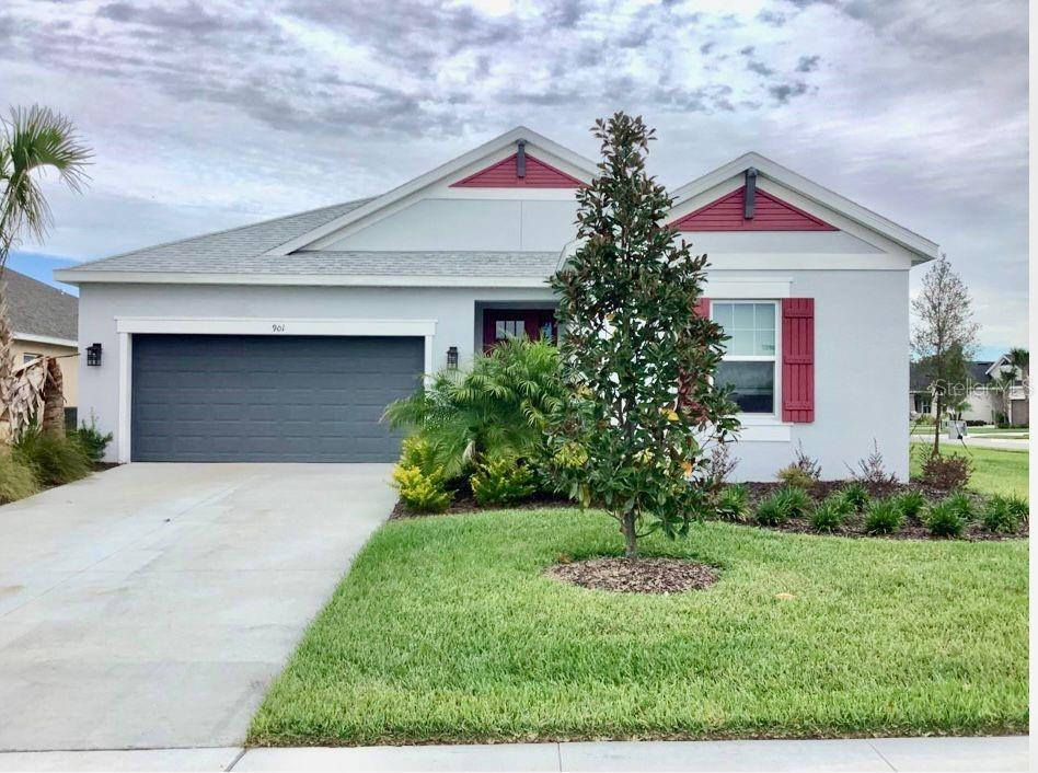 a front view of house with yard