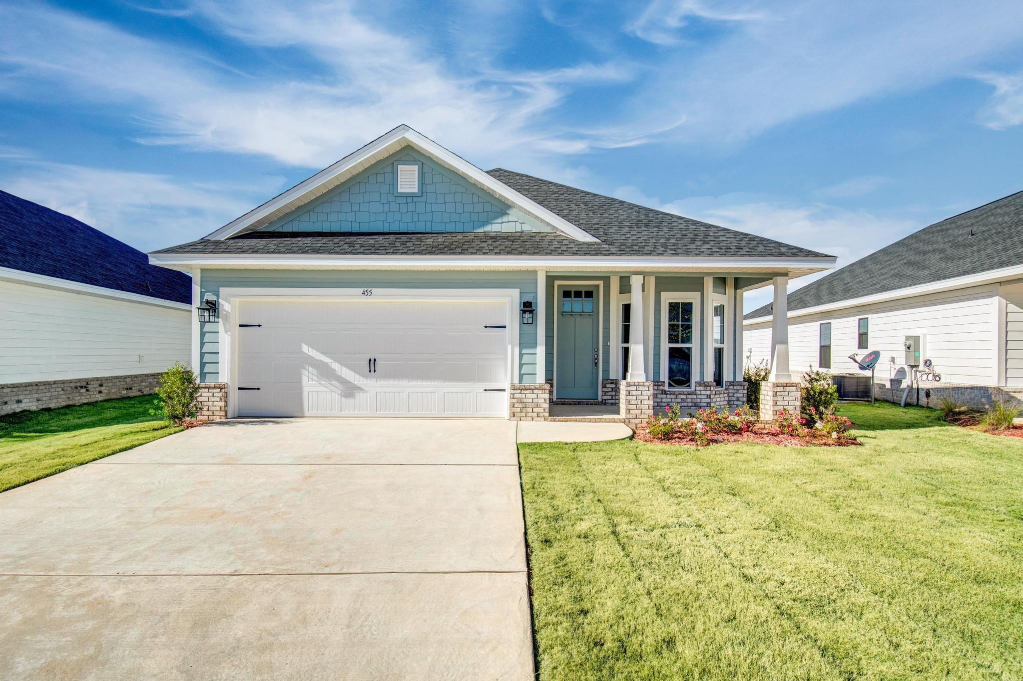 a front view of a house with patio