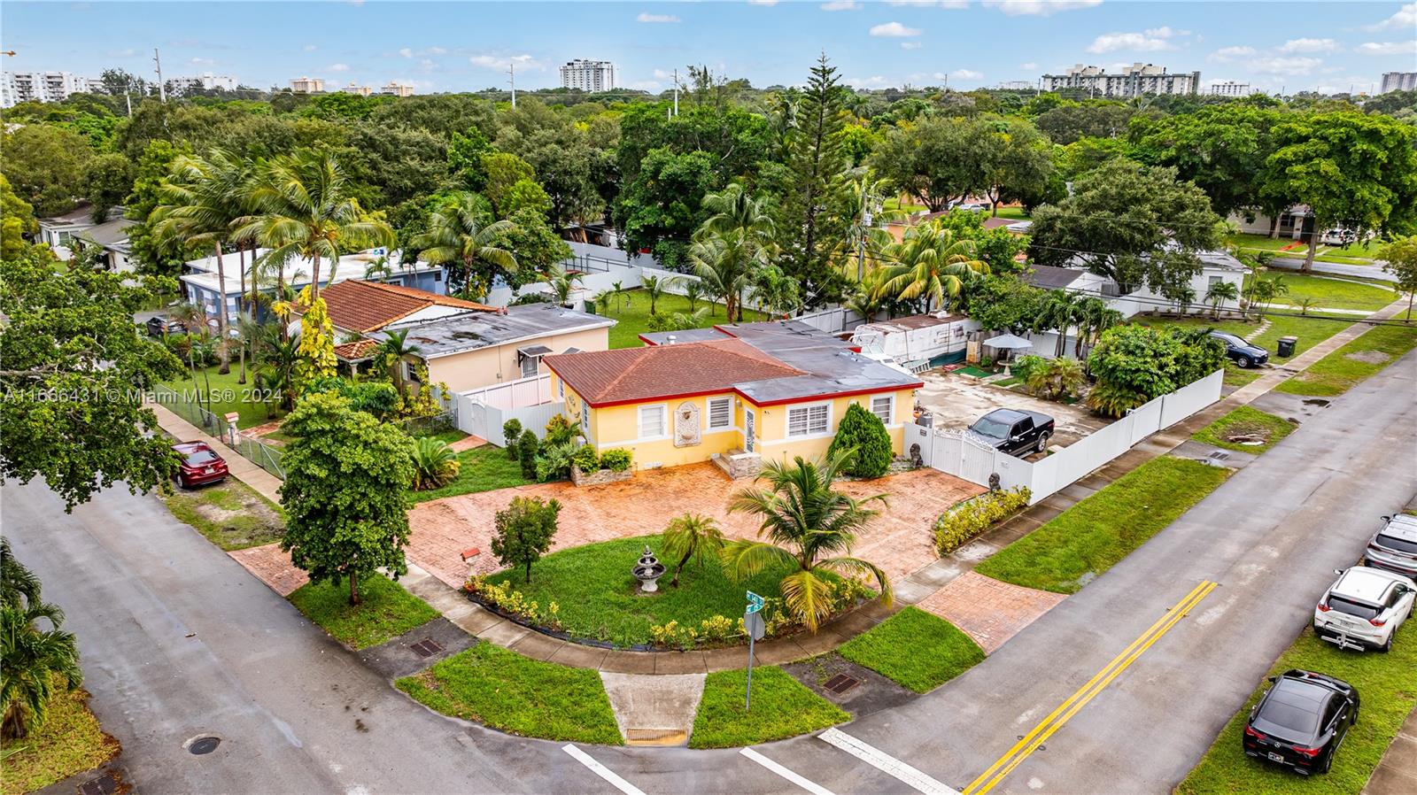 an aerial view of a house with a garden