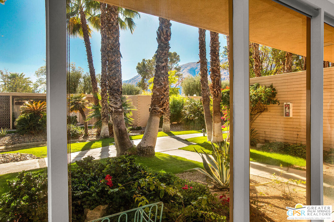 a view of swimming pool from a window