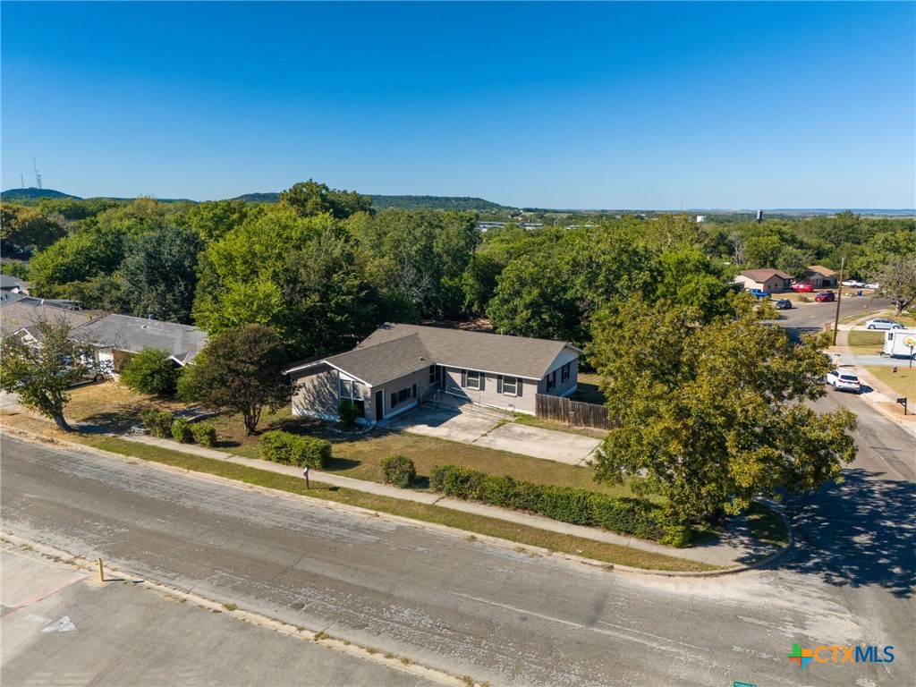 an aerial view of a house with a garden